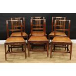 A set of six Regency mahogany dining chairs, curved backs with turned cresting rails, boarded seats,