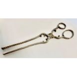 A pair of Victorian silver scissor action asparagus tongs, tapering undulating blades, shaped
