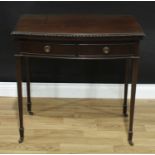 An Edwardian mahogany bow fronted card table, of George III design, folding top with carved edge