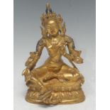 Chinese School, gilt bronze, of a deity, seated in thee karana gesture, warding off evil and