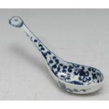 A Worcester Maltese Cross rice spoon, in underglaze blue, flower terminal, 13.5cm long, crescent