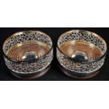 Stuart Devlin (1931 - 2018) - a pair of Elizabeth II silver cylindrical wine coasters, textured