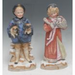 A rare pair Gebruder Heubach bisque figures, from the Pet Series, Boy with Pugs and Girl with a