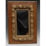 A 19th century parcel-gilt oak and gesso rectangular looking glass, rectangular mirror plate