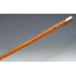 A George III gentleman's gold-mounted malacca walking cane, quite plain, brass walking tip, 90cm