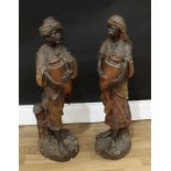 A pair of Austrian Orientalist terracotta figures, modeled as Nubian water carriers, each exotically