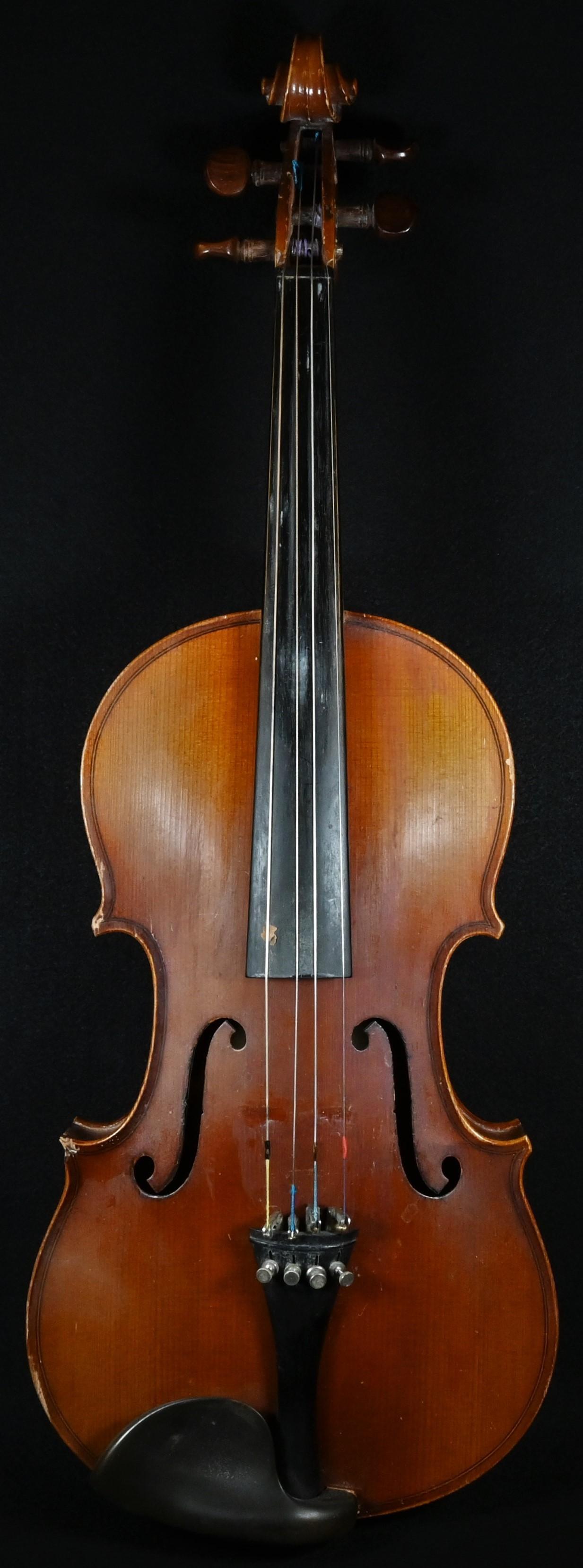 A violin, the two-piece back 36cm long excluding button, outlined throughout with purfling, 60cm