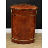 A French Louis XVI Revival gilt metal mounted kingwood and marquetry corner floor cabinet, pierced