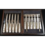 A mid-Victorian six-setting canteen of silver and mother-of-pearl hafted fruit knives and forks,