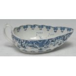 A Worcester Donut Tree pattern sauce boat, decorated in under glaze blue with stylised trees and