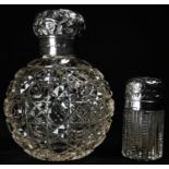 A Victorian silver mounted hobnail-cut clear glass globular scent bottle, domed cover chased with