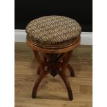 A Victorian rosewood adjustable piano stool, circular stuffed-over seat, the base with turned