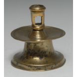 A 16th century Spanish brass capstan candlestick, pierced cylindrical sconce, broad slightly