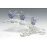 A large Murano table centre, with three amethyst birds perched on a ribbed clear glass branch,
