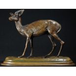 Agathon Leonard (1841 - 1923), after, a brown patinated bronze, of a deer, signed in the maquette,