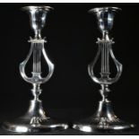 A pair of Victorian Neo-Classical Revival silver lyre shaped candlesticks, of George III design,