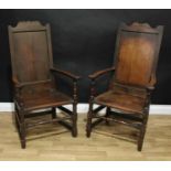 A near pair of 18th century oak Wainscot armchairs, shaped crestings, scroll arms, turned and