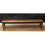 A Victorian oak hall bench, oversailing rectangular seat above a nulled frieze, turned legs, 43cm to