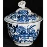 A Worcester Fence pattern sucrier and cover, printed in tones of blue, flower finial, 13cm high,