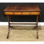 A 19th century mahogany sofa table, rounded rectangular top above a pair of frieze drawers, sabre