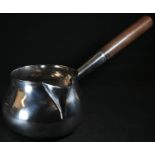 A large George III Irish silver brandy saucepan, hardwood handle, the socket terminating in a