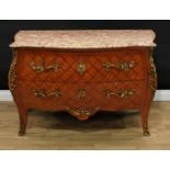 A Louis XV style gilt metal mounted kingwood bombe-shaped commode, marble top above two long