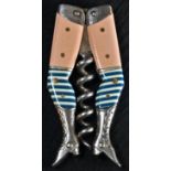 A German novelty travelling pocket picnic corkscrew, of risqué design as a pair of lady's legs, in