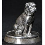 A Victorian silver novelty canine desk weight or model, as a pug seated on a barrel top, 4.5cm high,