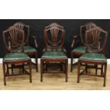 A set of six Hepplewhite design mahogany dining chairs, comprising four side chairs and a pair of