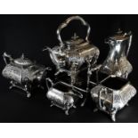 A Victorian Neoclassical silver plated five piece tea service, Spirit kettle on stand, coffee pot,