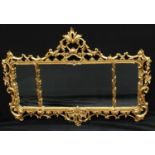 A giltwood looking glass, in the French Rococo taste, by Brights Of Nettlebed, rectangular mirror