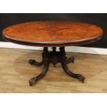 A Victorian burr walnut oval breakfast table, quarter veneered top above a deep frieze, turned