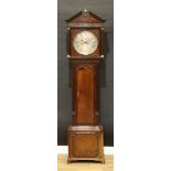 A good decorative and well-proportioned George III Staffordshire long case clock, dark oak and