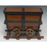 A French novelty cigar box, scratch-built as a railway truck, hinged cover, riveted borders, brown