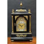 A substantial Victorian gilt metal mounted ebonised musical bracket clock, 17.5cm arched brass