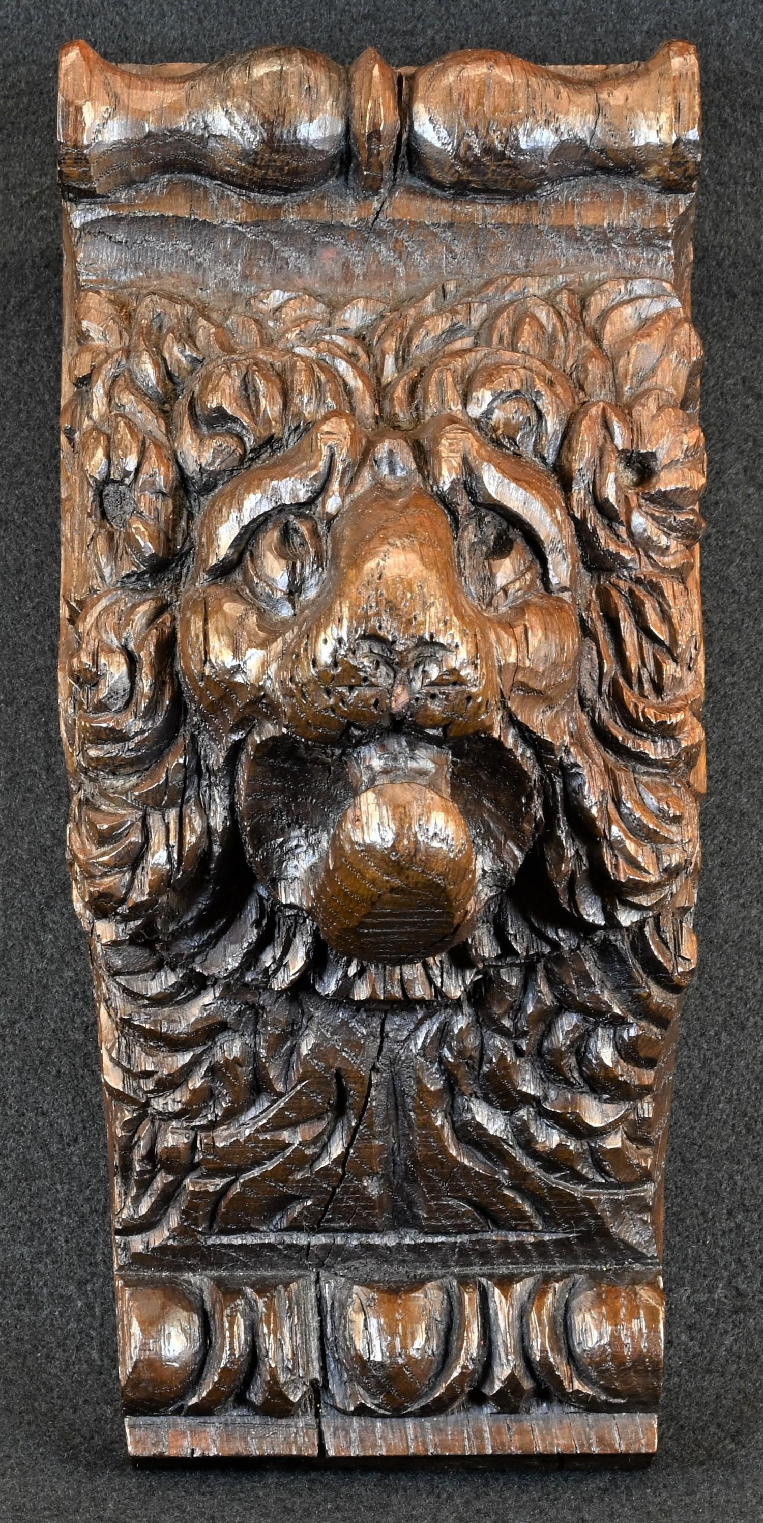 An 18th/19th century oak corbel, carved with a lion mask, 23cm long - Image 2 of 4