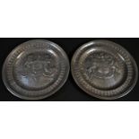 A pair of pewter heraldic chargers, chased with the arms and motto of the cities of London and
