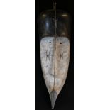 Tribal Art - a large Fang Ngil mask, concave features decorated in white pigment, 75cm long,