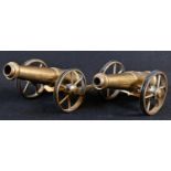 A pair of scratch-built brass desk model cannons, 15cm barrels, spoked wheels, 21.5cm long overall