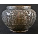 A Middle Eastern Cairo ware ovoid jardiniere, profusely damascened with Egyptian figures and