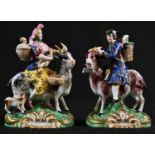 A pair of Samson figures, of the Welsh Tailor and his wife, spurious Derby marks, 12cm high,