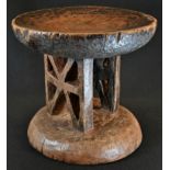 Tribal Art - a Tonga stool, dished circular top, geometric twin-section underframe, domed base, 28cm