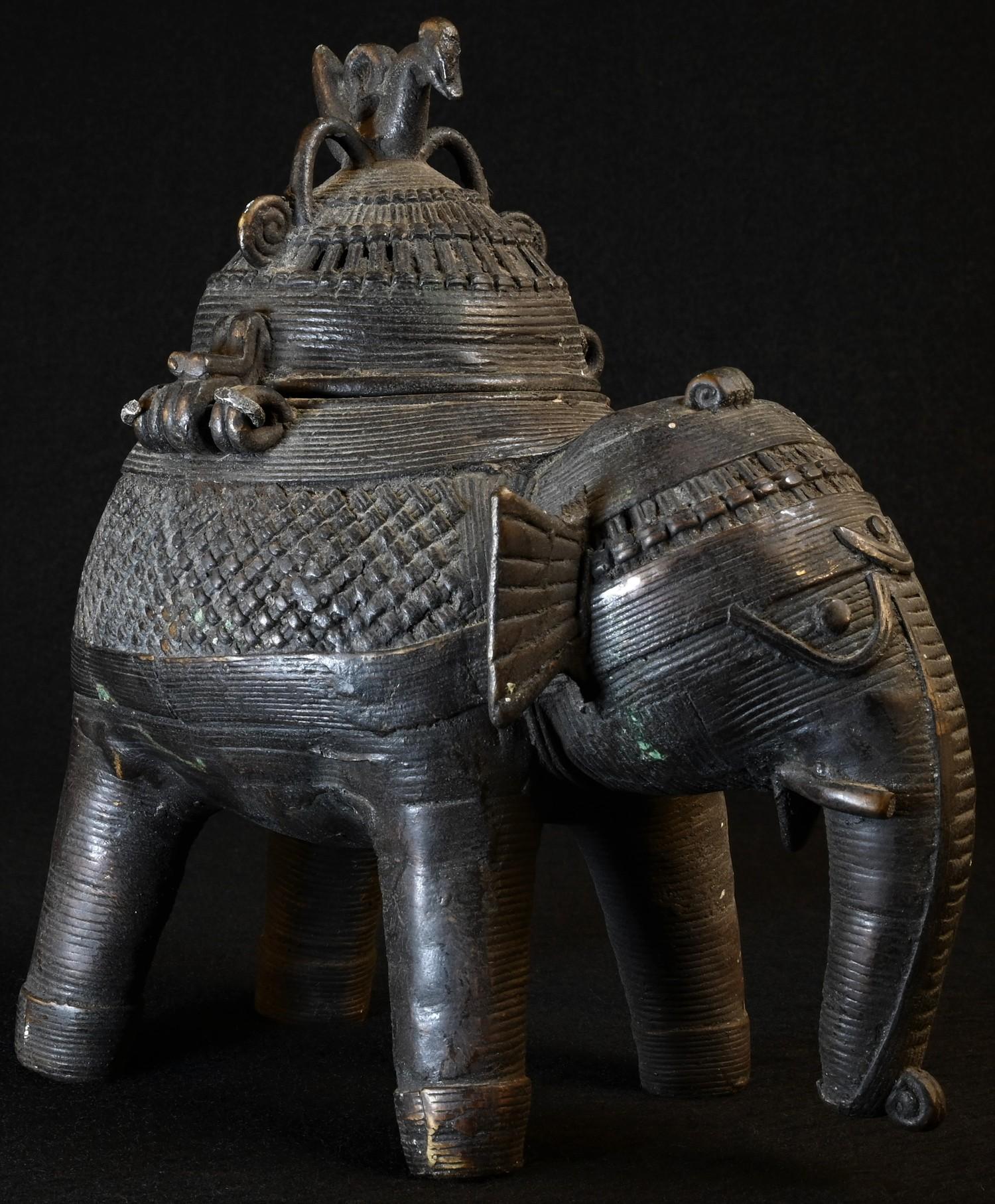 A 19th century Indian dark-patinated bronze censer, as an elephant, the hinged cover as a stylized - Image 6 of 6