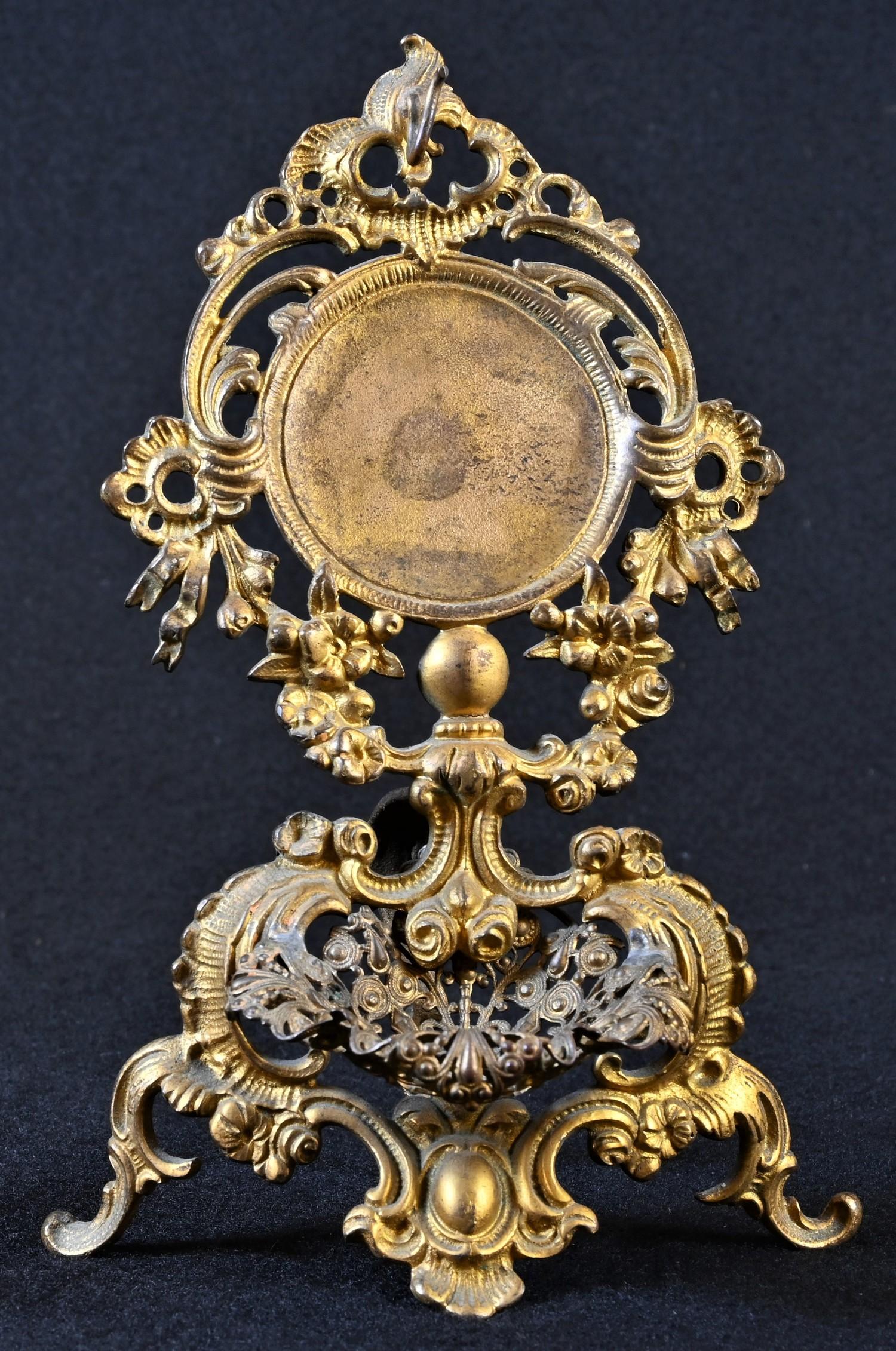 A 19th century French Rococo Revival gilt metal pocket watch stand, pierced and cast throughout with - Image 2 of 2