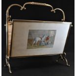 An unusual French polished brass articulated drawing room periodical rack, the folio stands