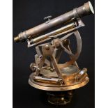 A George IV brass surveying theodolite,by W & T Gilbert, London, 12cm silvered compass dial, 180