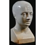 A 19th century phrenology head, quite plain and completely glazed in white, 19cm high