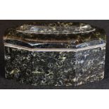 A 19th century specimen marble canted lozenge-shaped inkwell, the slightly domed hinged cover