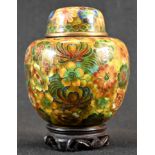 A Chinese cloisonne enamel ovoid ginger jar and cover, decorated in polychrome with dense layered