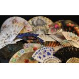 A late Victorian souvenir fourteen-stick softwood and paper fan, The Hôtel Metropole London [now the